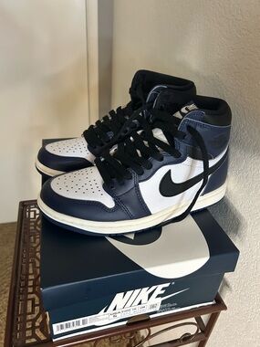 Nike Air Jordan 1 Retro High IG shoes.